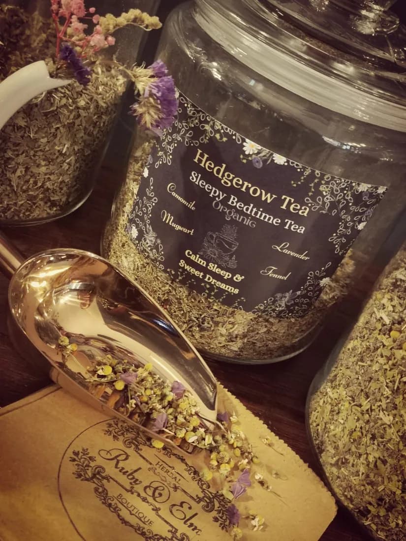 Sleepy Bedtime Tea blend in its labelled apothecary jar